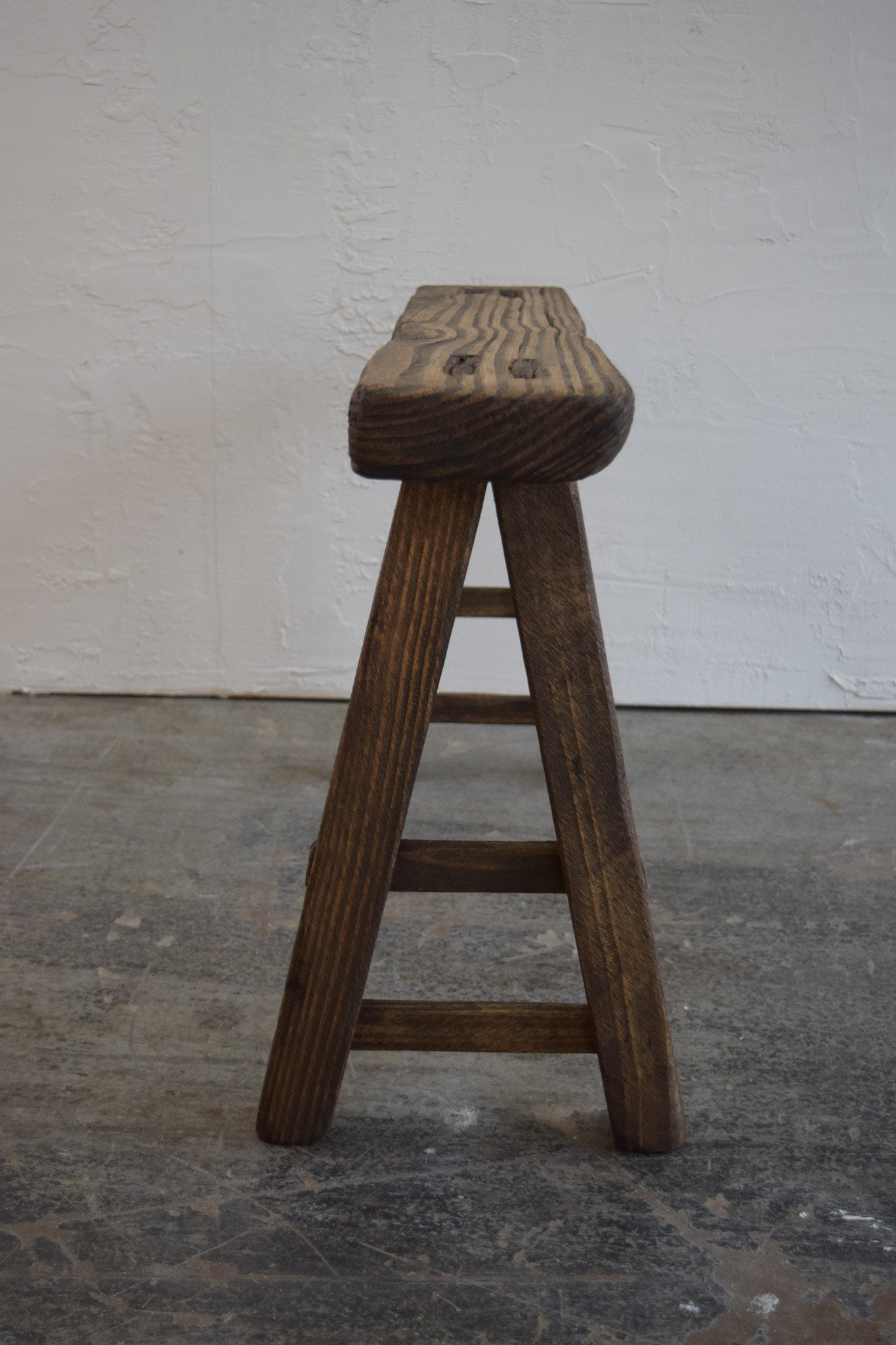 Slender bench tail view