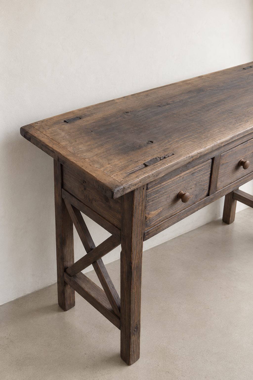 Angled view of The Hewn Console showing its substantial wood frame