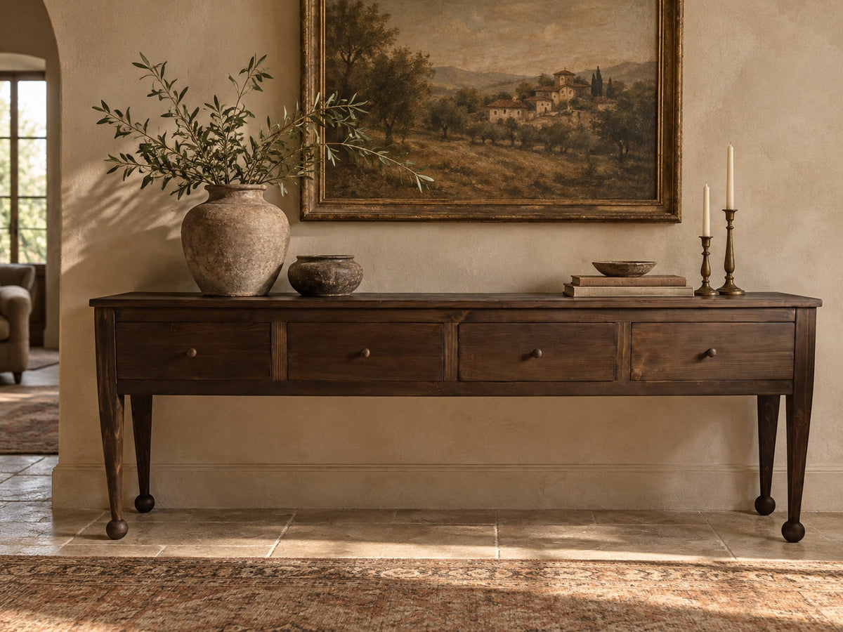 The Estate Console in Aged Umber finish, styled in a warm European-inspired interior