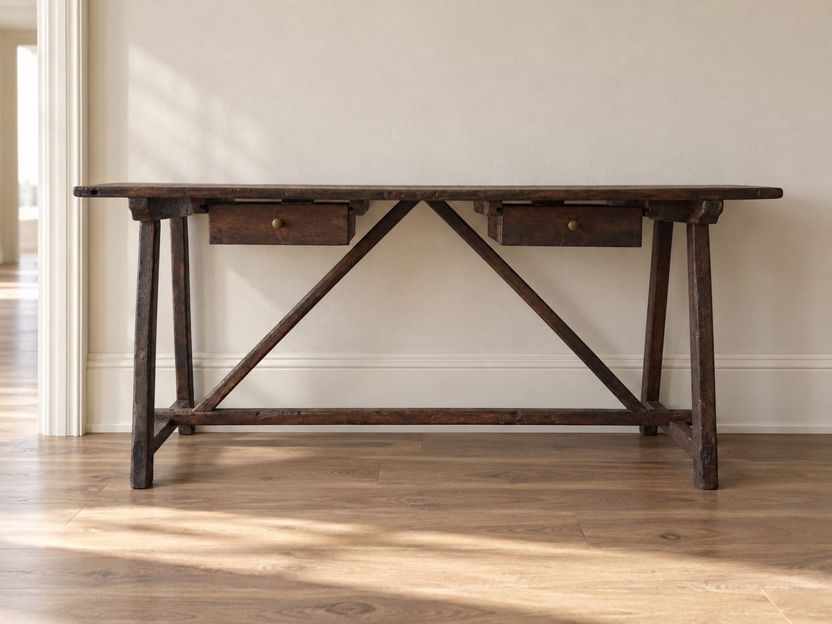 The Trestle Console against a warm neutral wall in a home